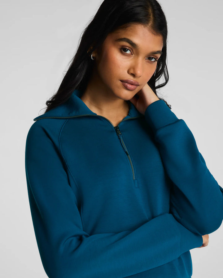 HALF ZIP AIRESSENTIALS